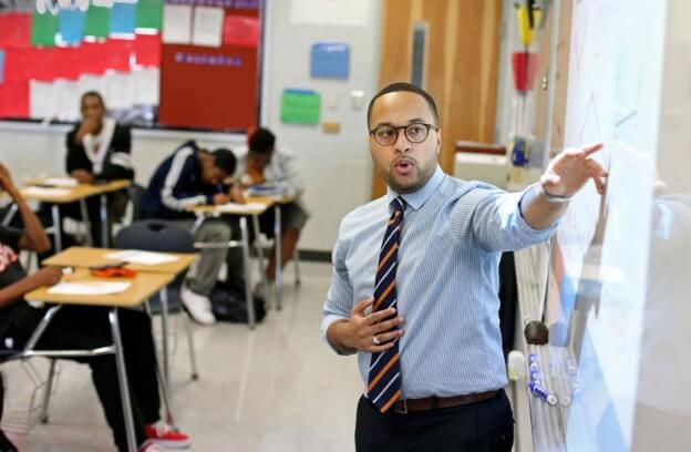 Teacher teaches in a classroom